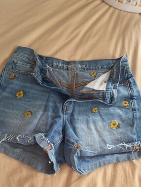 American Eagle Outfitters Blue Denim Shorts with Yellow Floral Embroidery